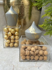 طقم ٢ بوكسات اكريليك مع غطاء ومسكه فخار بحجمين مختلفين باللون الرمادي والذهبي
